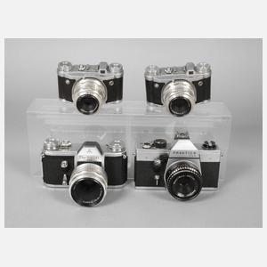 Vier Fotoapparate