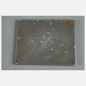 Eine Plakette und eine Medaille