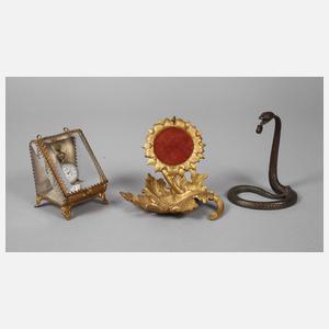 Drei Taschenuhrenhalter