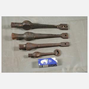 Vier Glockenschlägel