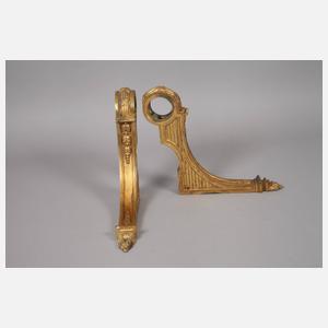 Vier klassizistische Gardinenstangenhalter