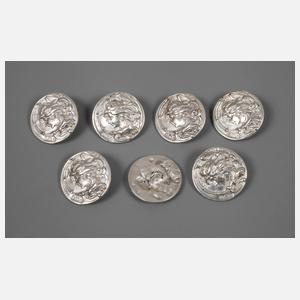 Sieben Silberknöpfe