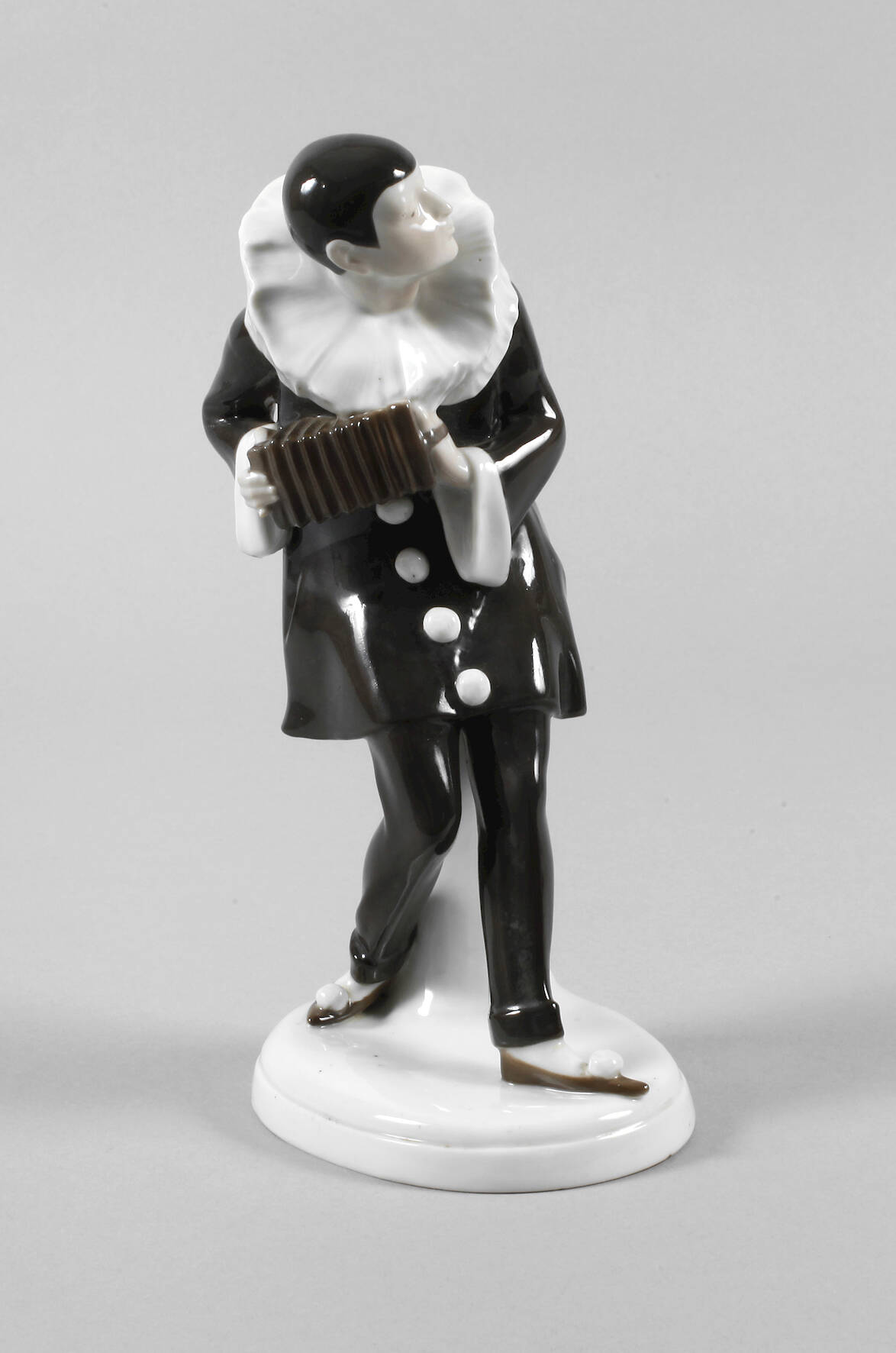 Schierholz Plaue "Pierrot mit Ziehharmonika"