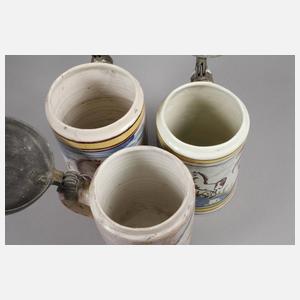 Drei Fayencewalzenkrüge