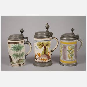 Drei Fayencewalzenkrüge