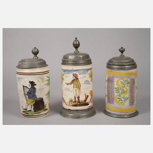 Drei Fayencewalzenkrüge