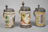 Drei Fayencewalzenkrüge