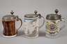 Drei Fayencewalzenkrüge