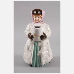 Figurenkanne als Autofahrerin