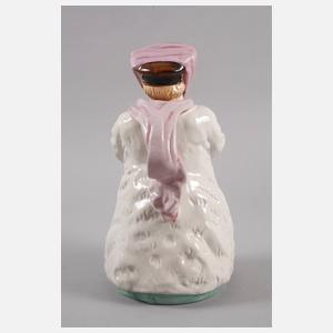 Figurenkanne als Autofahrerin