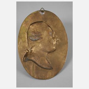 Paar Bronzeplaketten