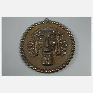 Fünf Bronzeplaketten