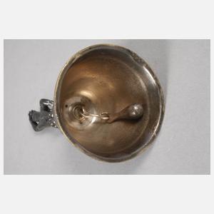 Figürliche Tischglocke