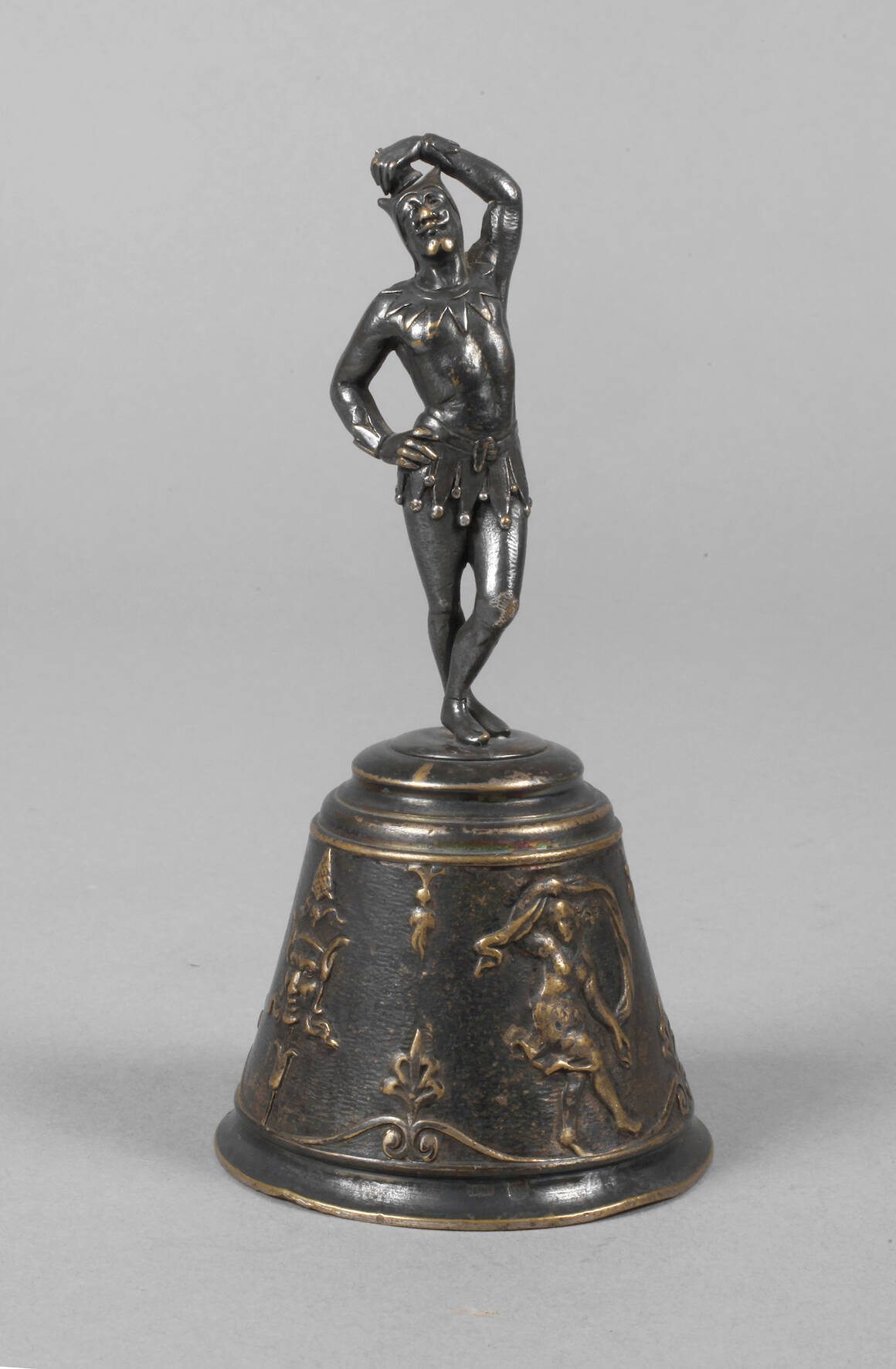 Figürliche Tischglocke