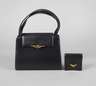 Handtasche und Portemonnaie Cartier
