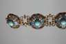 Großes Armband besetzt mit Türkisen und Korallen