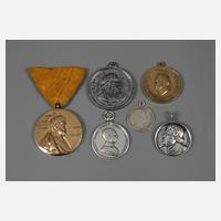 6 Medaillen111