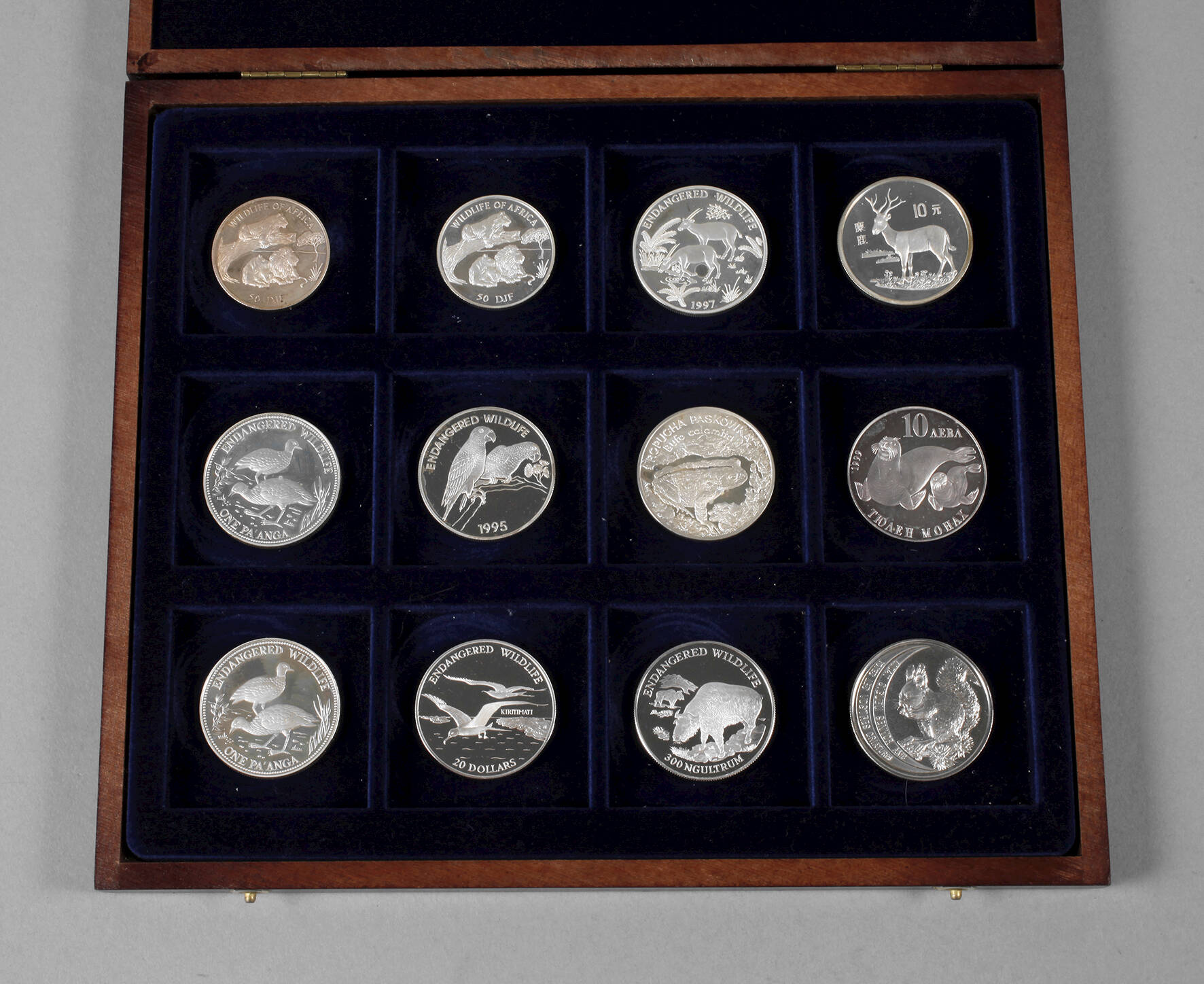 12 Silbermünzen Tiermotive