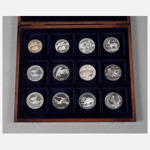 12 Silbermünzen Tiermotive