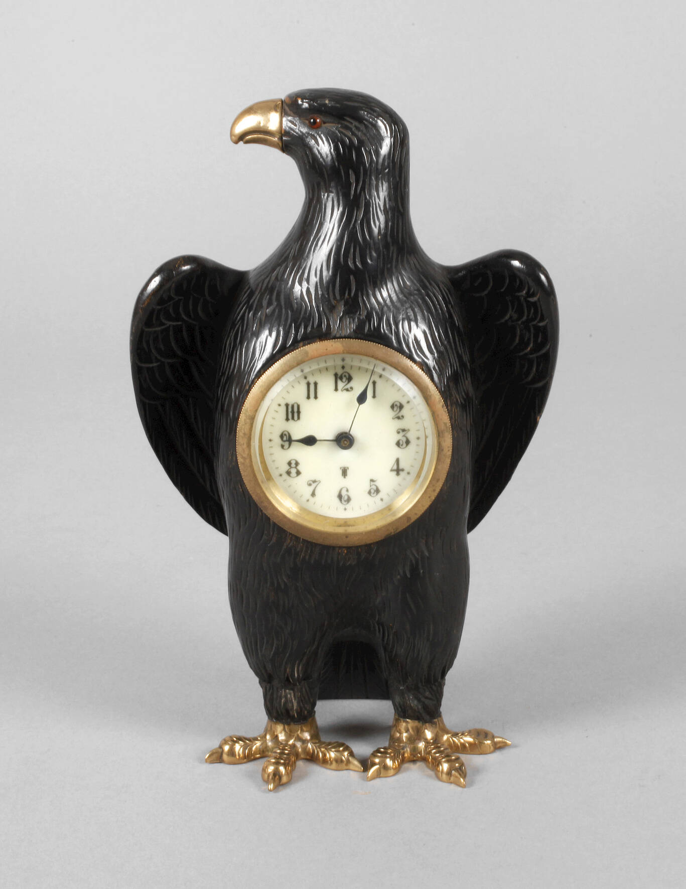 Tischuhr in Form eines Adlers