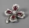 Brosche mit Rubinen und Brillanten