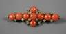 Brosche mit Korallen