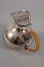 Silberkanne mit Basthenkel