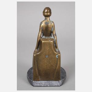 Figürliche Buchstütze