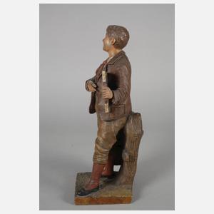 Goldscheider Wien Schuljunge mit Bilderrätsel