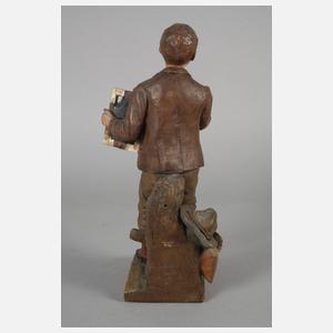 Goldscheider Wien Schuljunge mit Bilderrätsel