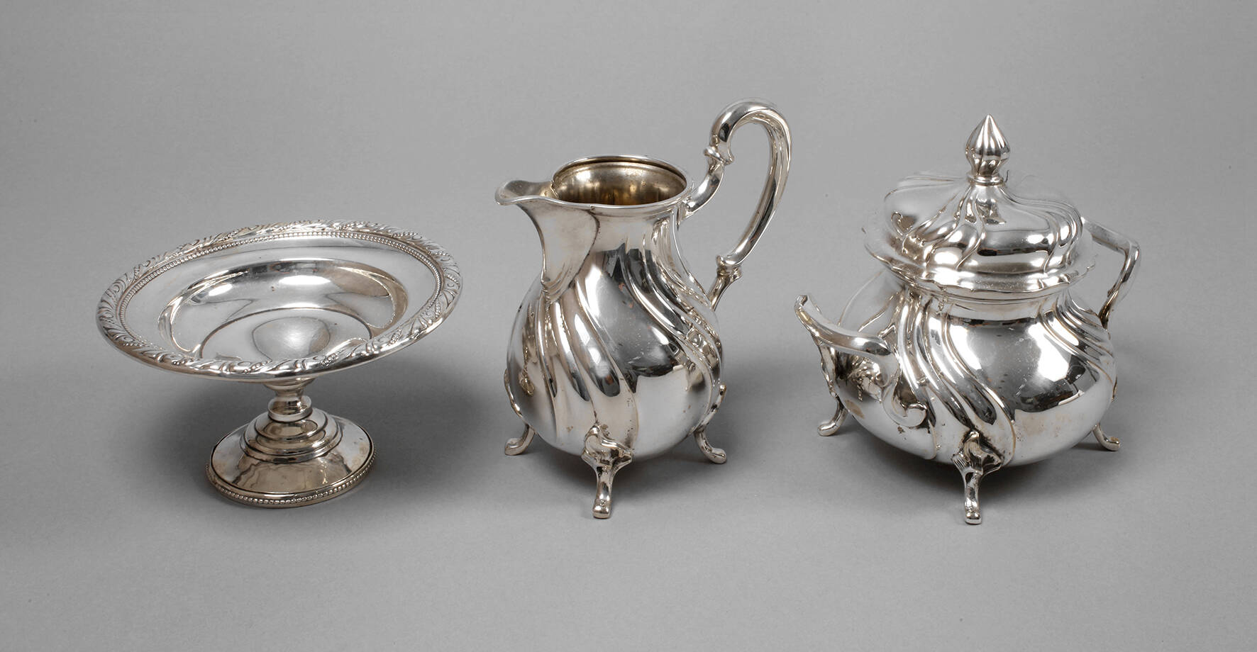 Zucker-/Sahneset Silber sowie Fußschale