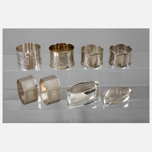 Acht Serviettenringe Silber
