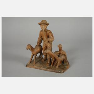 Drei figürliche Schnitzereien