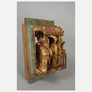 Figürliche Reliefschnitzerei