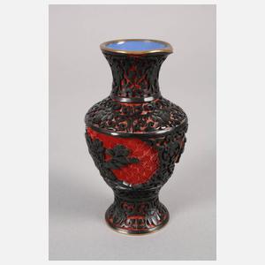 Vier Lackschnitzereien