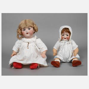 Zwei Porzellankopfpuppen als Charakterbabys