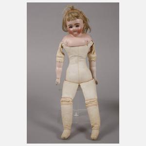 Konvolut Puppen und Kleidung