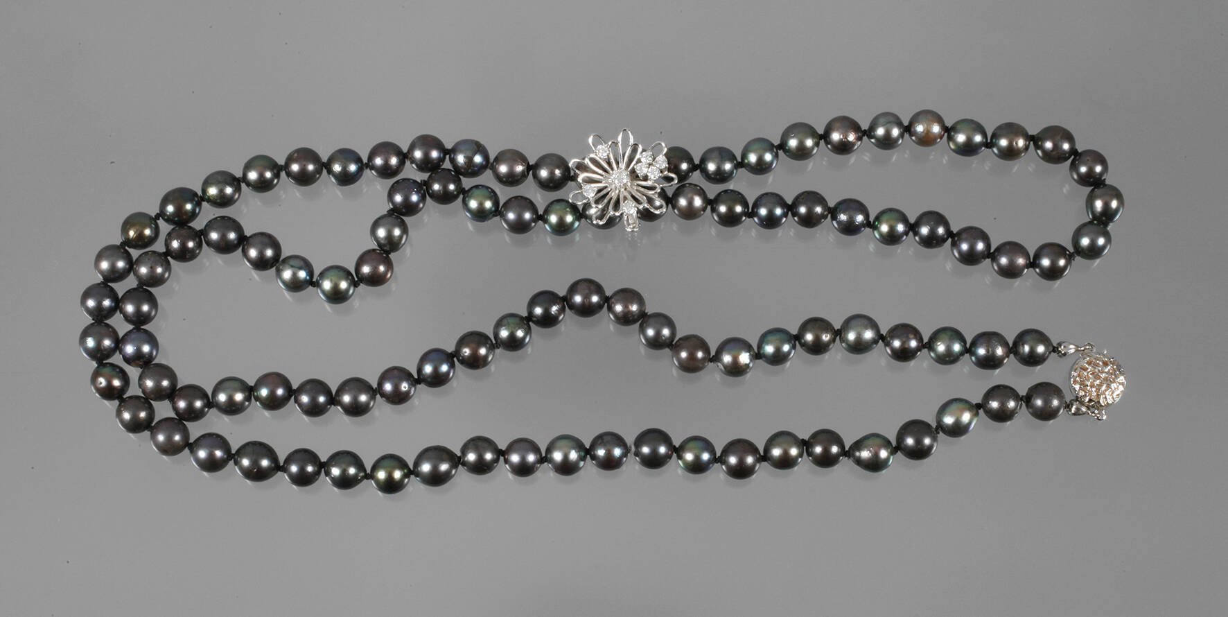 Lange Perlenkette mit Clip