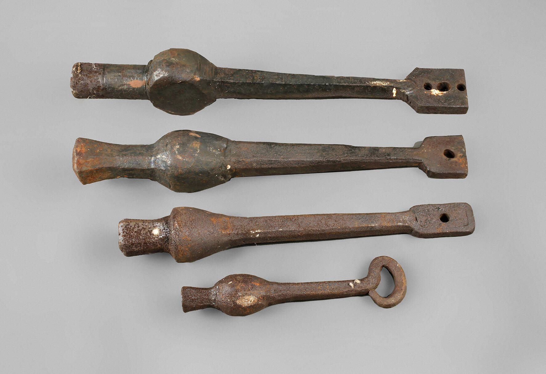 Vier Glockenschlägel