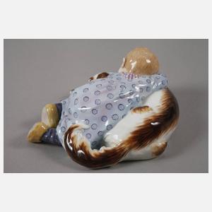 Meissen "Kind, auf einem Hund liegend"