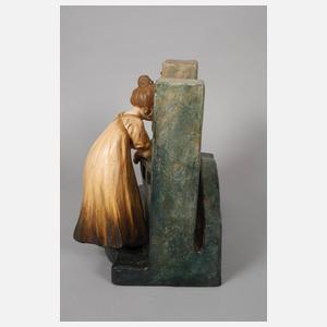 Figürlicher Spiegelhalter