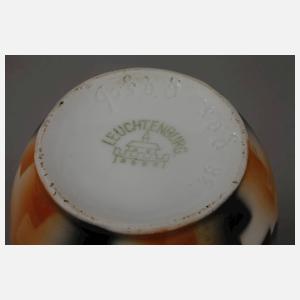 Leuchtenburg zwei Kakaokannen