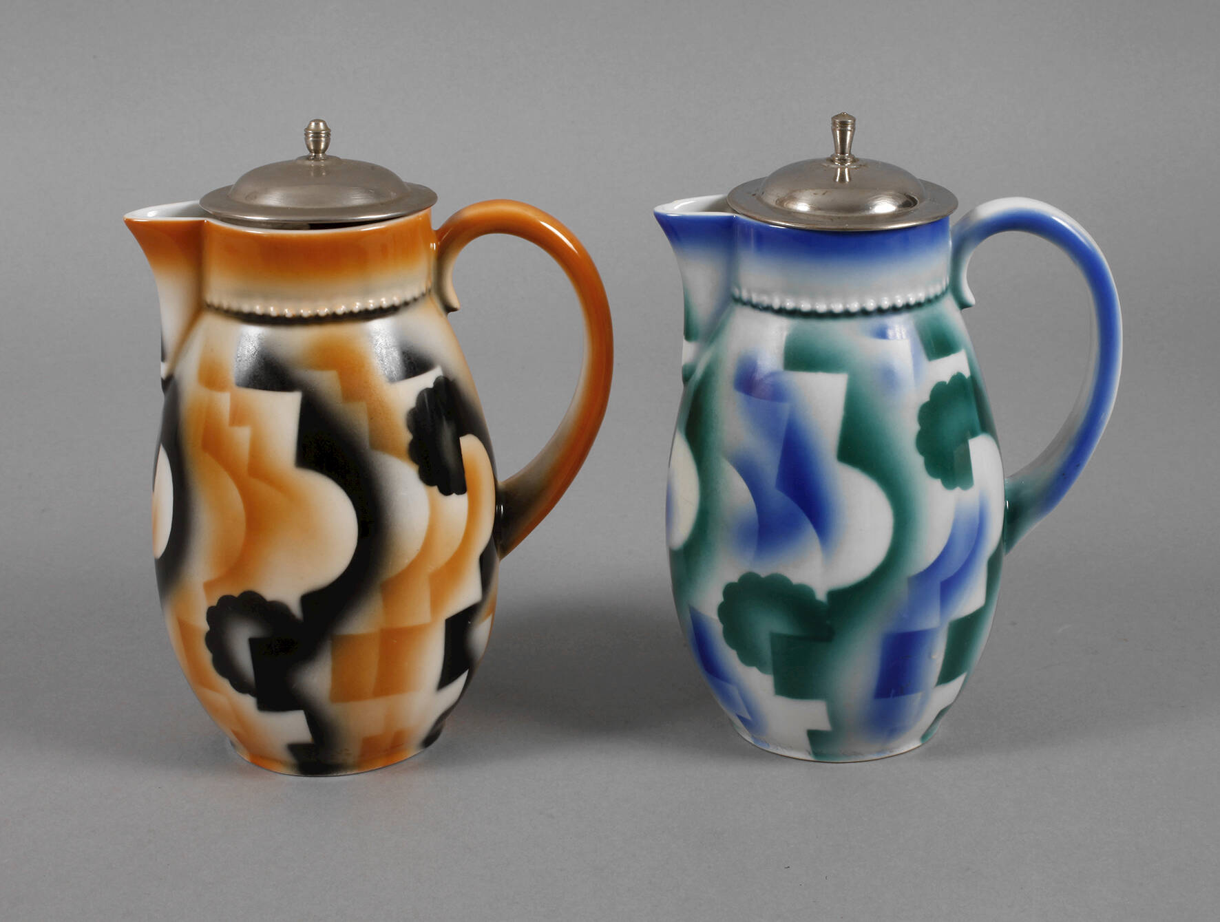 Leuchtenburg zwei Kakaokannen