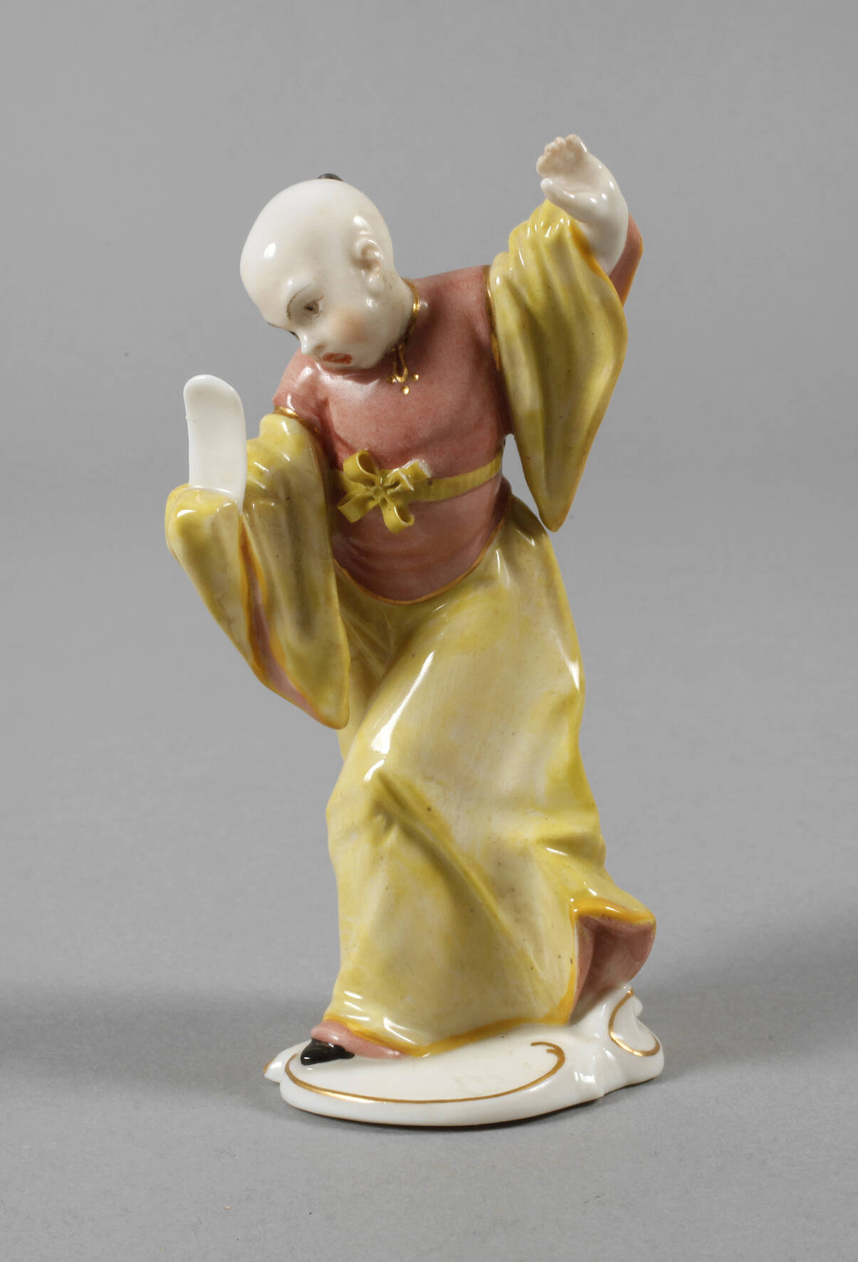 Nymphenburg "Chinesenknabe mit Notenblatt"