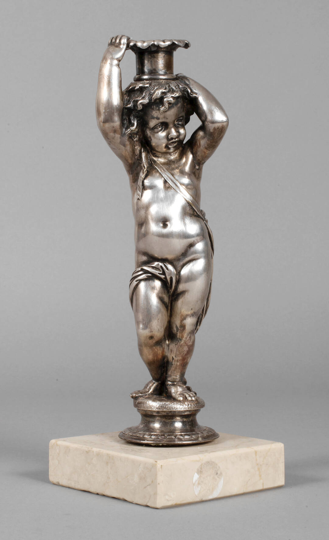 Putto als Kerzenleuchter