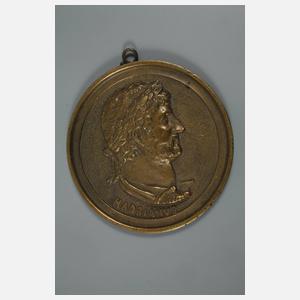 Fünf Bronzeplaketten