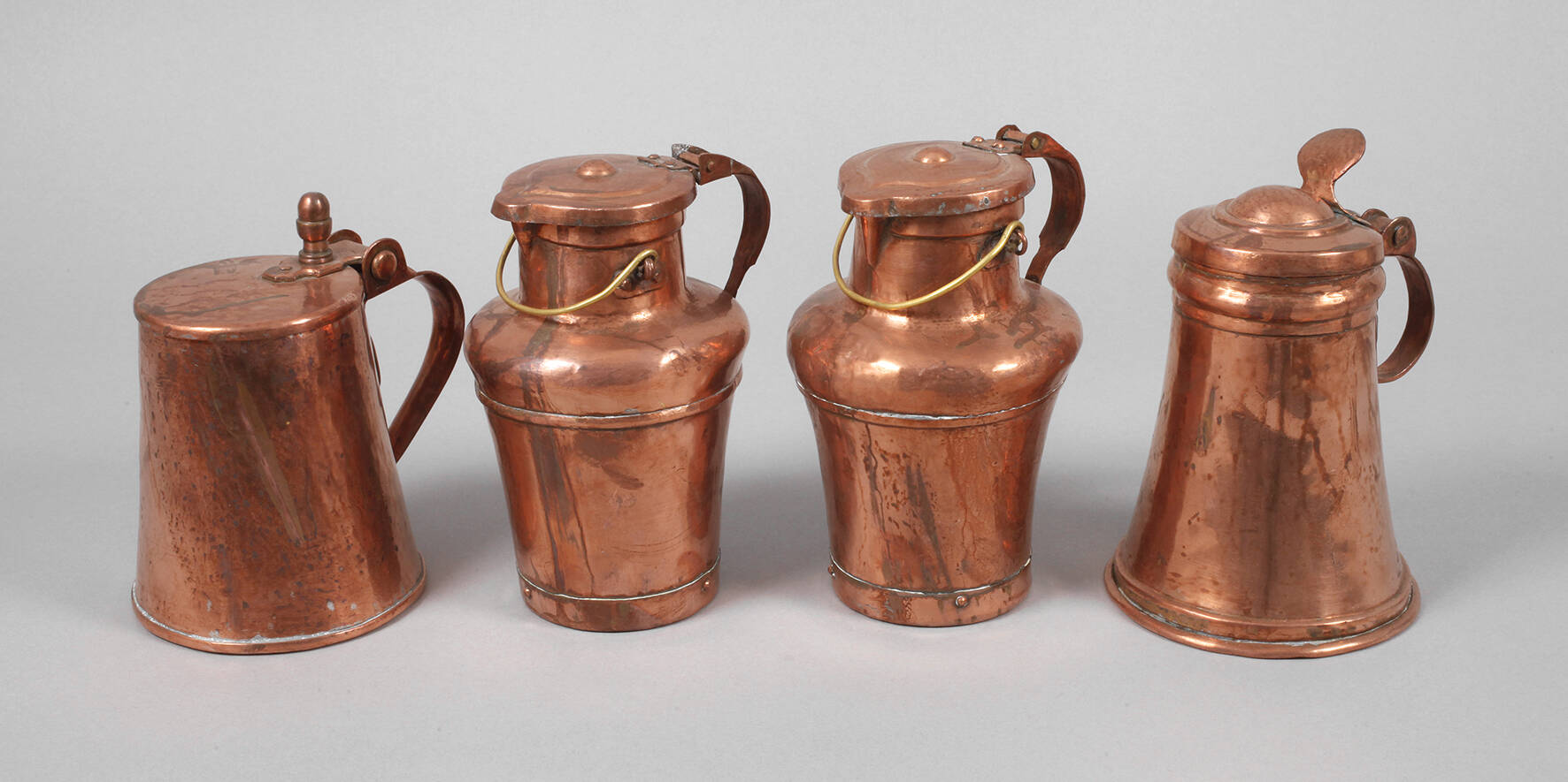 Vier Kupferkannen