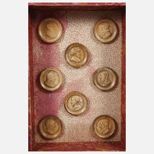 Drei Schatullen mit Spielsteinen