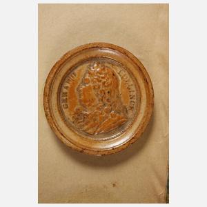 Drei Schatullen mit Spielsteinen