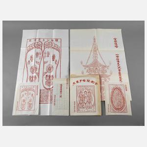 Drei buddhistische Plakate